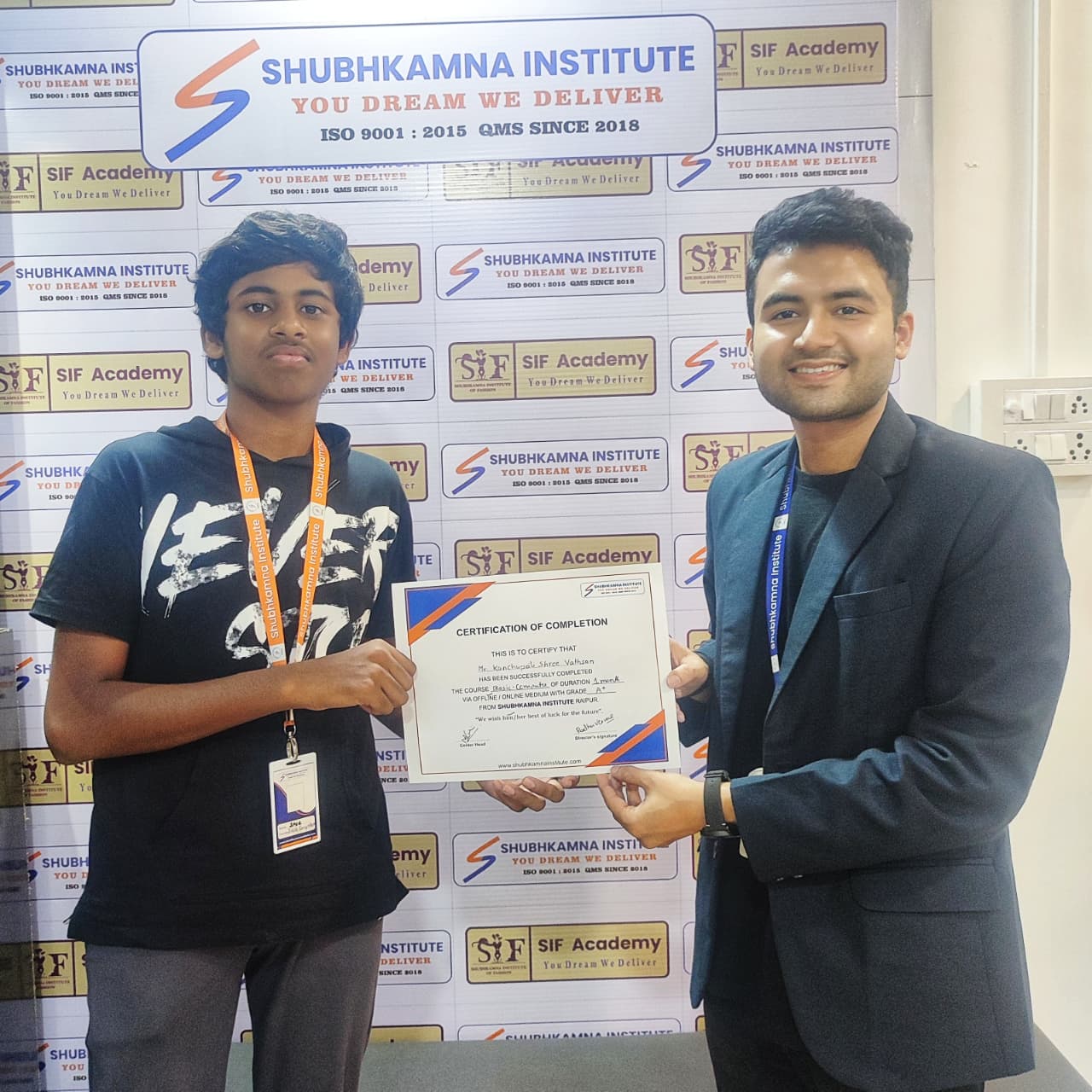 Student Receiving Certificate for Basic Computer Course